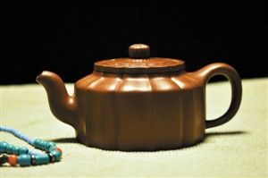 张明强作品《筋囊周盘壶》。