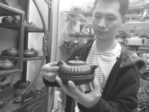 张先生的“宝壶”失而复得。