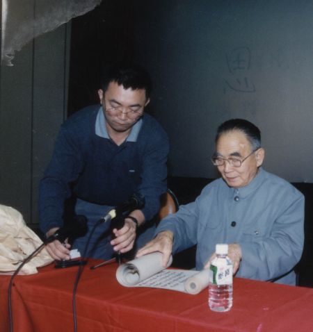 图1、本文作者朱万章（左）与苏庚春