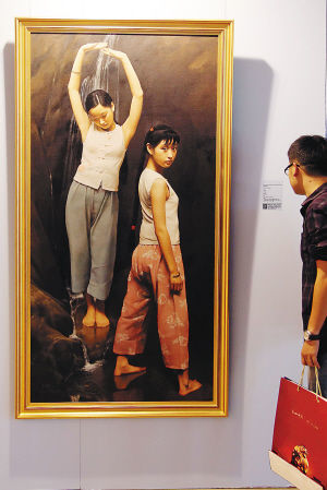 半山半岛2014新春收藏艺术大展中展示的写实油画 海南日报记者 武威 摄