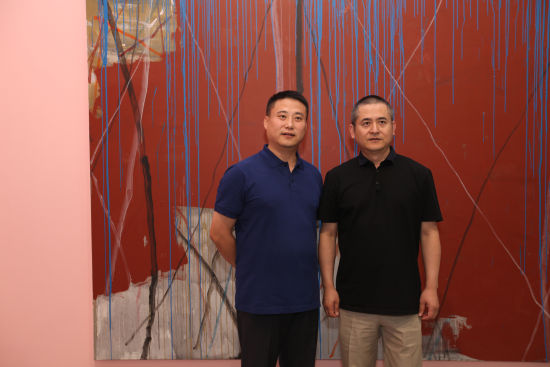 今格艺术中心董事长王杰与艺术家曾梵志