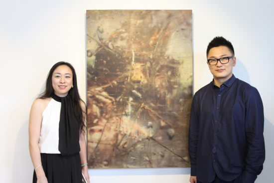 圣东方艺术中心董事长周鸣、艺术家闫占城