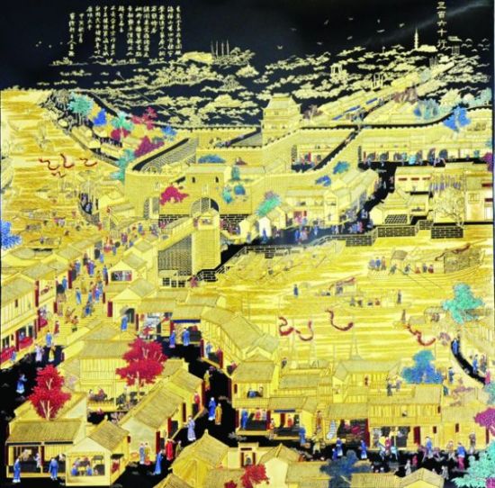 以清代苏州桃花坞木刻年画为蓝本的漆雕《苏州金阊图》完成。□记者姚永强摄