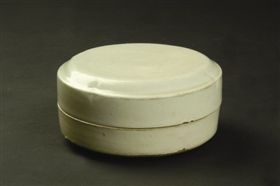 唐代白釉磨盘式粉盒