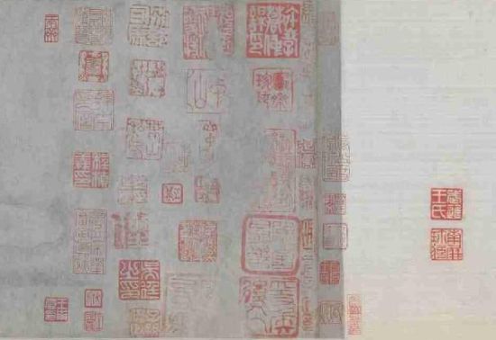 图五 王朴仁父亲王南屏旧藏米友仁《潇湘奇观图》(藏北京故宫博物院)上歪扭的印章现象(之一)