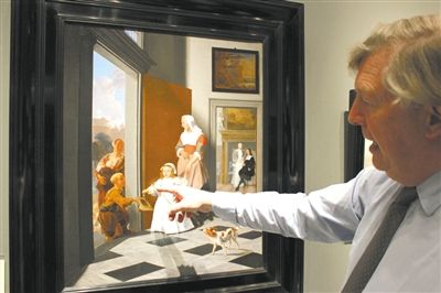 欧洲艺术博览会发起人之一、英国伦敦艺术经销商约翰尼·凡·海夫顿(Johnny Van Haeften)在博览会现场讲述由荷兰画家雅各布·奥克特维特(Jacob Ochtervelt)绘于1663年的作品《女仆与女孩》。这幅作品在今年1月30日纽约苏富比拍出了442.1万美元。 图 IC