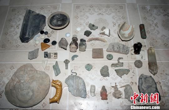图为考古出土的文物。　谭地　摄