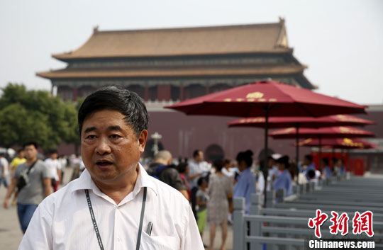 8月14日，故宫博物院院长单霁翔在北京宣布，从当日起故宫实行禁止火种进入，因此打火机、火柴等将不能带进“宫门”。中新社发 刘关关 摄  