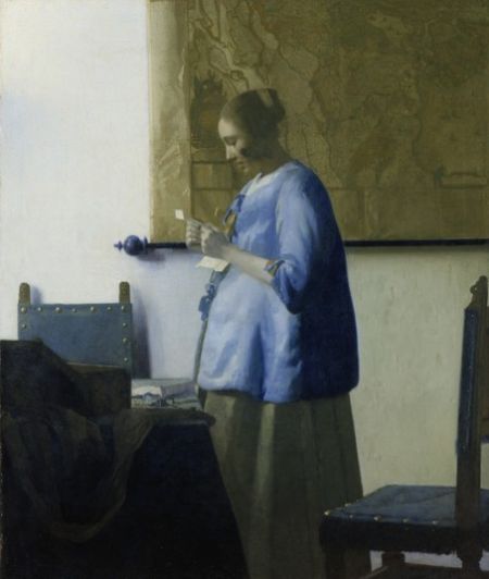 《穿蓝衣读信的少女》(1663-64)