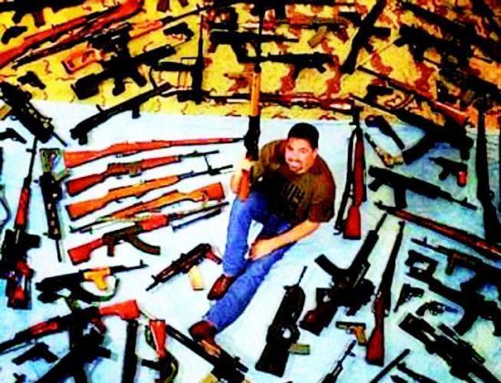 男子藏枪115支网上炫耀遭批评