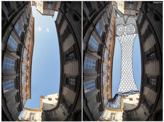 艺术家在高楼缝隙中的蓝天中尽情涂鸦