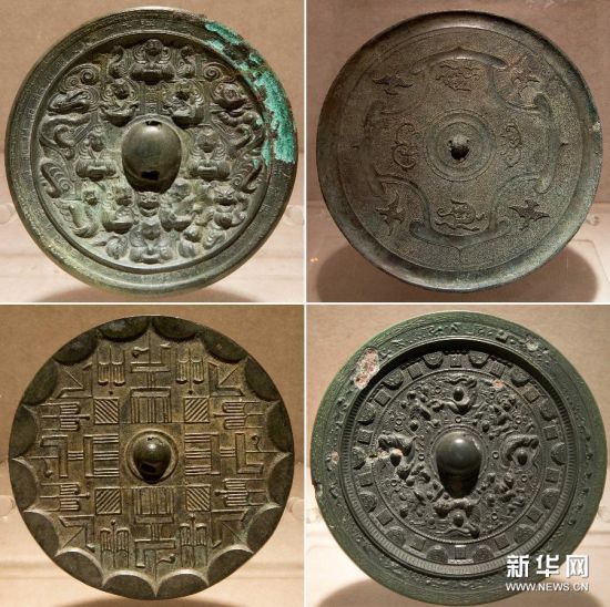 这是2月22日在江苏省盱眙县文物馆拍摄的东阳出土文物展品—铜镜(拼版照片)。
