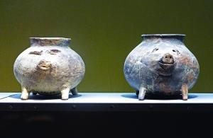 新石器时代的泥质猪形盛水器。