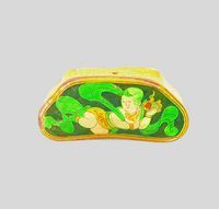 磁州窑三彩童子松叶形枕