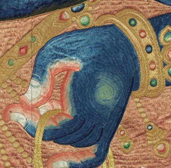 唐卡细部可见织工精巧。