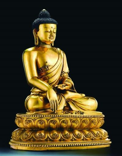 明永乐鎏金铜“释迦牟尼佛”坐像。