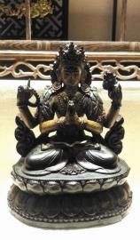 清紫檀四臂观音。图片由受访者提供