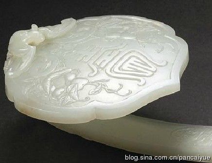 清乾隆白玉浮雕-福寿双全福禄万代如意(保利香港2013春拍)