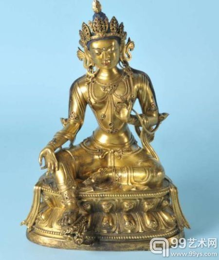 图为被拍卖的铜鎏金绿度母坐像