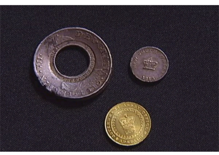 3枚被拍卖的硬币网页截图