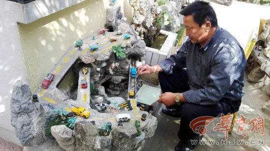 宝鸡57岁老人收藏奇石 打造山水微景观(组图)
